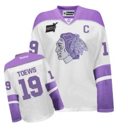 Women's Reebok Chicago Blackhawks #19 Jonathan Toews Premier White/Purple Thanksgiving Edition NHL Jersey